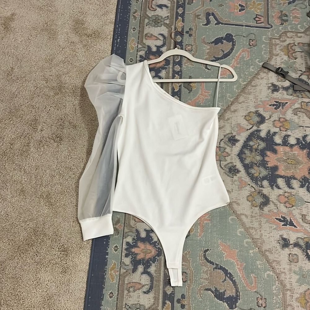NWT one sleeve body suit